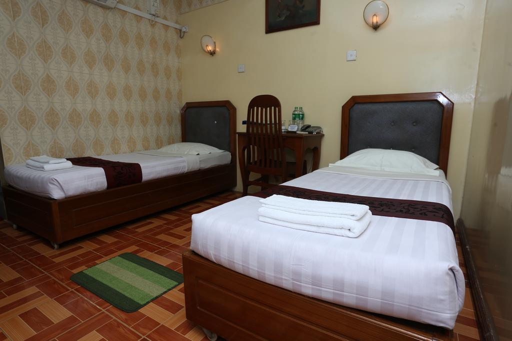 Beautyland Hotel II Yangon Quarto foto